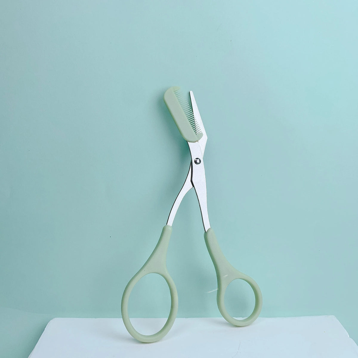 green Color Eyebrow Trimming Scissors With Comb – Precise Shaping Tool
